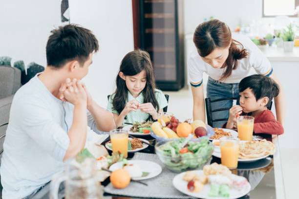istock Asian family at dining room 983652592