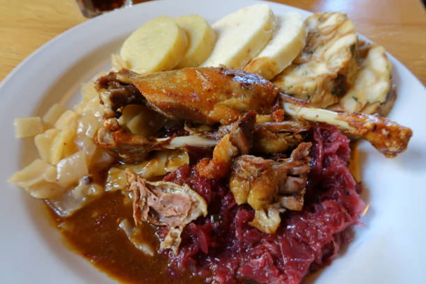istock duck with red cabbage, dumplings and onion mash potato 983668552