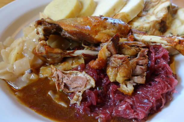 istock duck with red cabbage, dumplings and onion mash potato 983668594