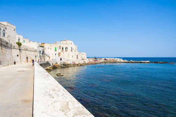 istock Giovinazzo beach viewed from seafront promenade, Apulia, Italy 983675318