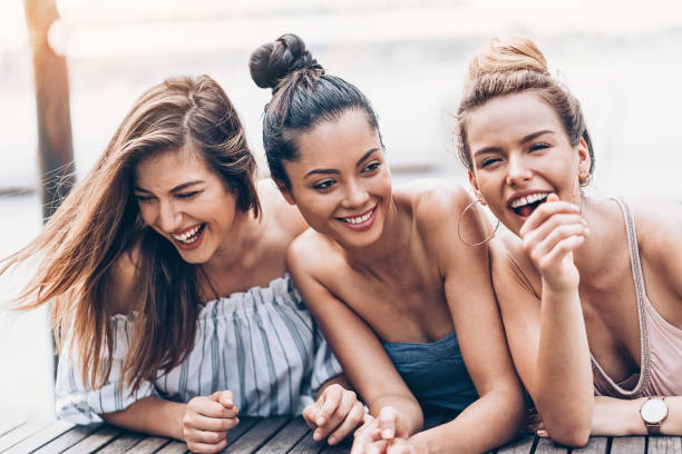 istock Three girls resting outdoors 983676206