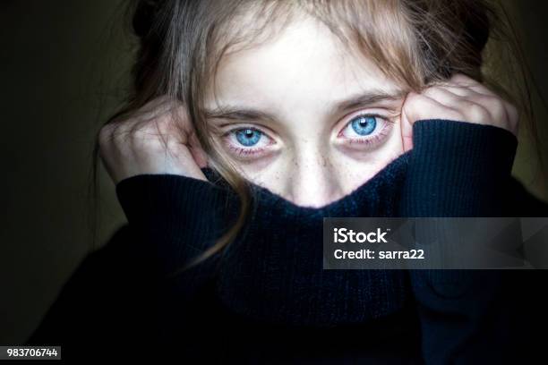 Girl Hiding Her Face Stock Photo - Download Image Now - Child, Shock, Fear
