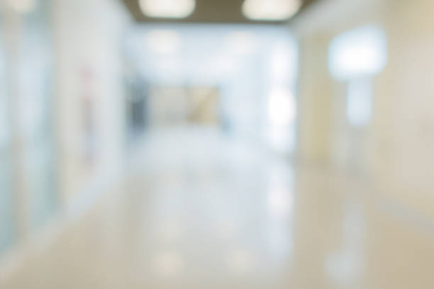 istock blur image background of corridor office hospital walkway 983709970