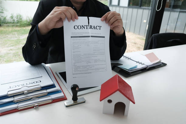 istock businessman tearing agreement document. breaking contract 983710372