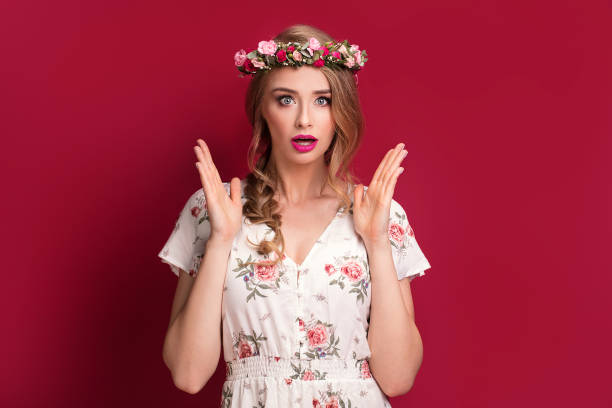 istock Beauty female model with flowers headband. 983732012