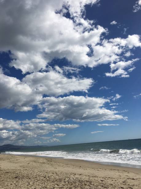 istock Dramatic sky at the shore in California 983739854