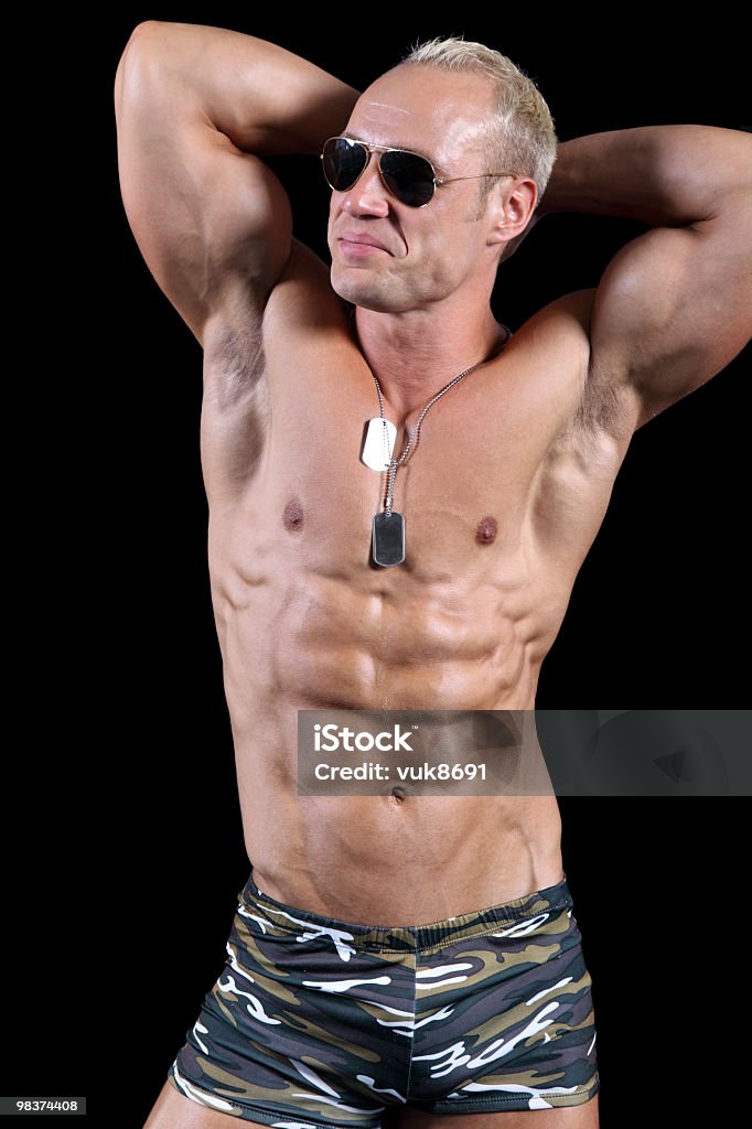 Bodybuilder posando - Foto de stock de Abdomen humano libre de derechos