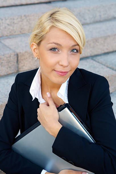 istock Businesswoman with laptop computer 98374655