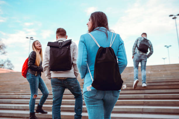 istock Group of Students with Backpacks Walking to School 983752646