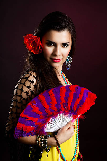 istock Beautiful gypsy woman with fan 98375724