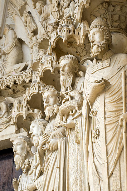 Chartres (France) - Cathedral exterior, statues Chartres (Eure-et-Loir, Centre, France) - Exterior of the gothic cathedral: statues on the facade (13th century). Unesco World Heritage Site. chartres cathedral stock pictures, royalty-free photos & images