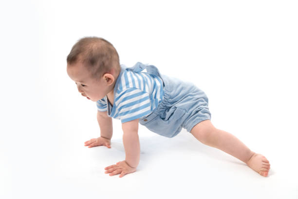 istock The baby was sitting on the floor playing 983775558