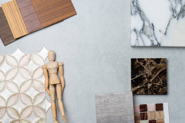 istock samples of material, wood , on concrete table.Interior design select material for idea. 983793408