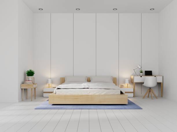 istock Modern white bedroom bright interior with wooden wall 983793540