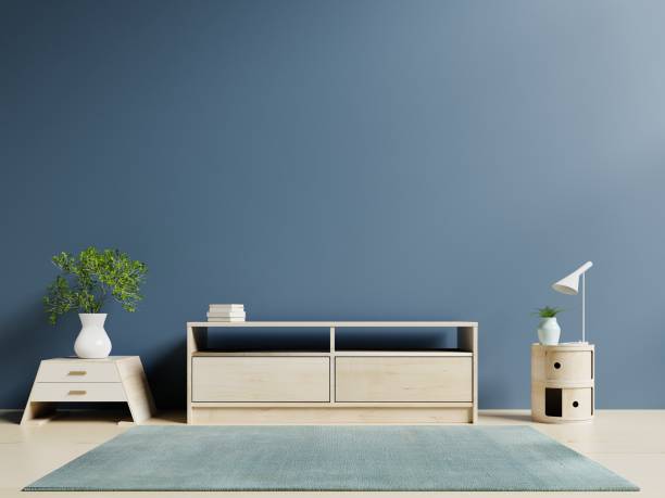 istock Tv cabinet in modern empty room and dark wall background 983793574