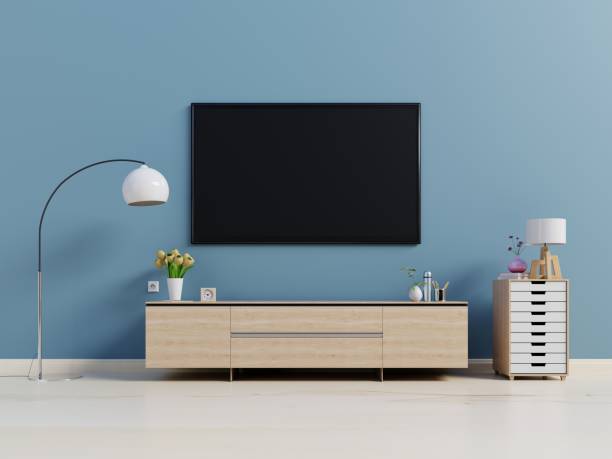 istock Smart Tv cabinet in modern empty dark room 983793628