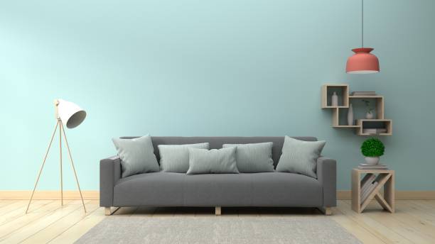 istock Living Room Interior with sofa and lamp on empty blue wall background 983793672