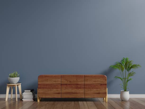 istock Cabinets for TV in a dark room, dark walls 983793686
