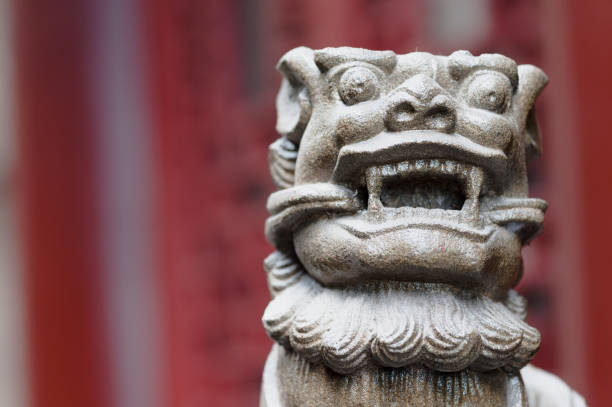 istock Lion stone statue in a buddhist temple 983793862