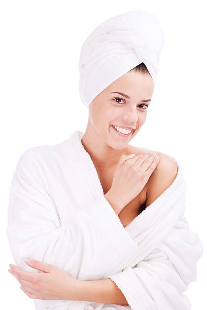 istock Girl putting cream on her shoulder 98379697