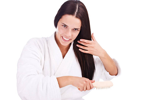 istock Girl brushing her hair 98379707