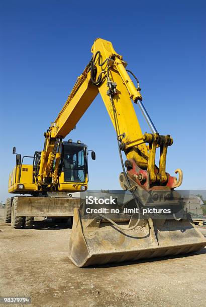 Excavator Stock Photo - Download Image Now - Backhoe, Blue, Building - Activity