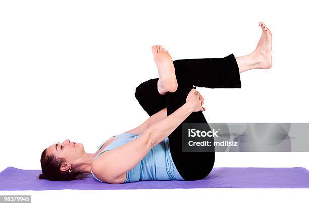 Woman In Yoga Position Stock Photo - Download Image Now - Adult, Backgrounds, Balance