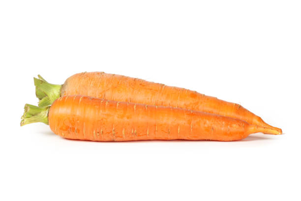istock One carrot isolated on white background with clipping path 983804196