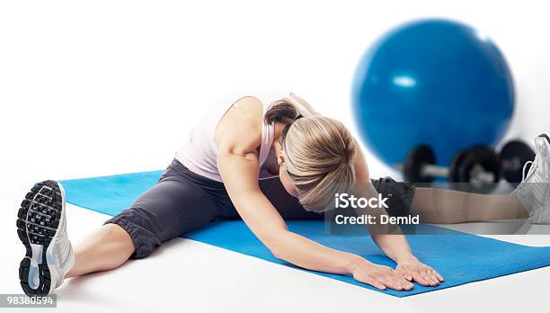 Sportswoman Stretching Stock Photo - Download Image Now - Adult, Adults Only, Aerobics