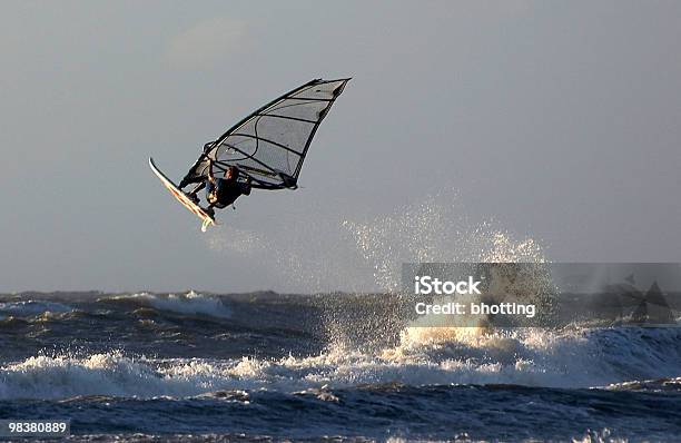 Sunset Jump Stock Photo - Download Image Now - Windsurfing, Jumping, Surfing