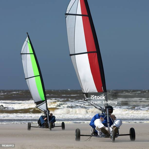 Beach Trike Race Stock Photo - Download Image Now - Beach, Blowing, Breaking Wave