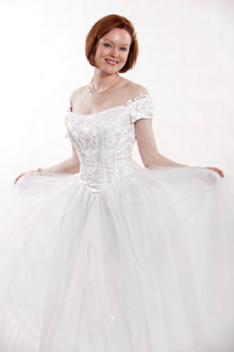 Woman in white wedding dress - isolated photo portrait