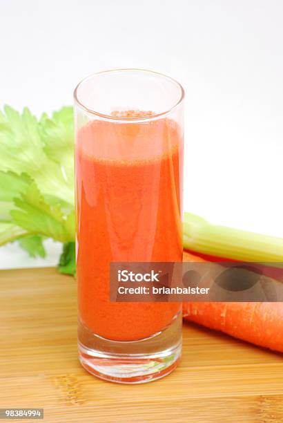 Raw Carrot Vegetable Juice Stock Photo - Download Image Now - Antioxidant, Shot Glass, Brightly Lit