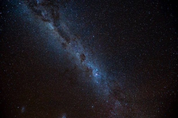 istock A tree silhouetted against the brilliant milky way stars night sky 983865282