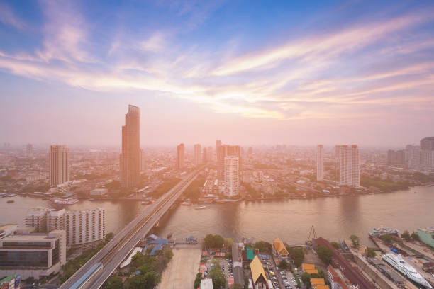 istock Aerial view Bangkok city with river curved 983873726