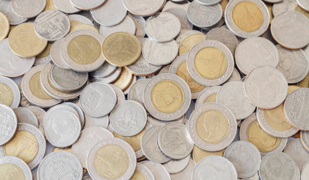 istock Many of Thai baht coins. 983920732