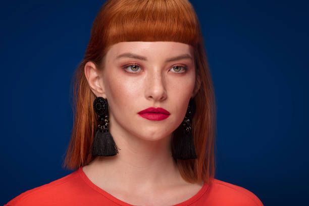 istock Elegant redhead woman posing. 983934946