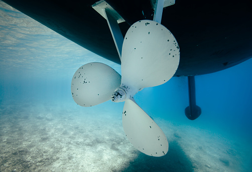 Ship propeller underwater.