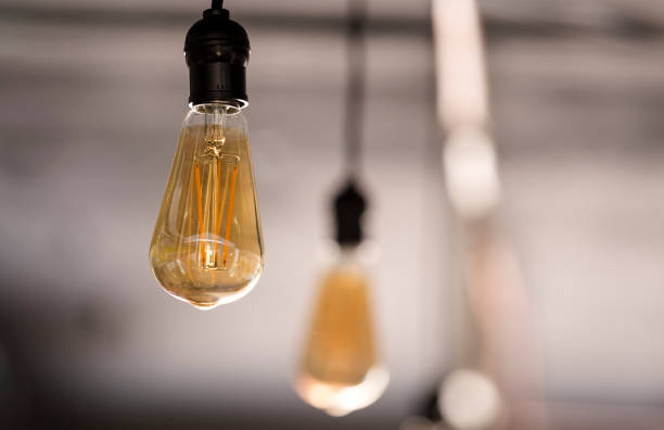 istock Energy saving vintage LED bulbs hanging 983942810