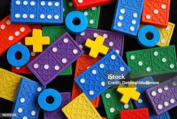 Colorful Wooden Quotxquots And Quotoquots With Dominoes Background Stock Photo - Download Image Now