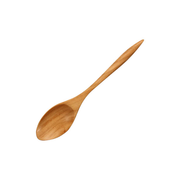 istock Wooden spoon on white background 983954612