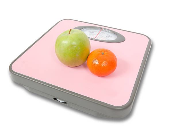 istock Pink Weighing Scales and fruits 98395525