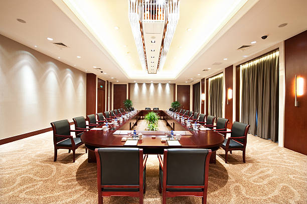 istock Conference room with a long table and lots of chairs 98395721
