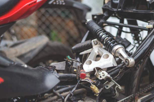 istock motorcycle repair with soft-focus and over light in the background 983959192