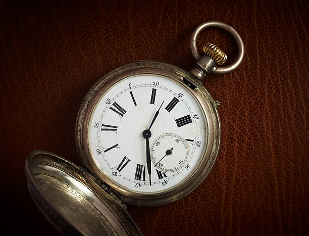 istock Old pocket watch on the natural brown leather background. 98396170