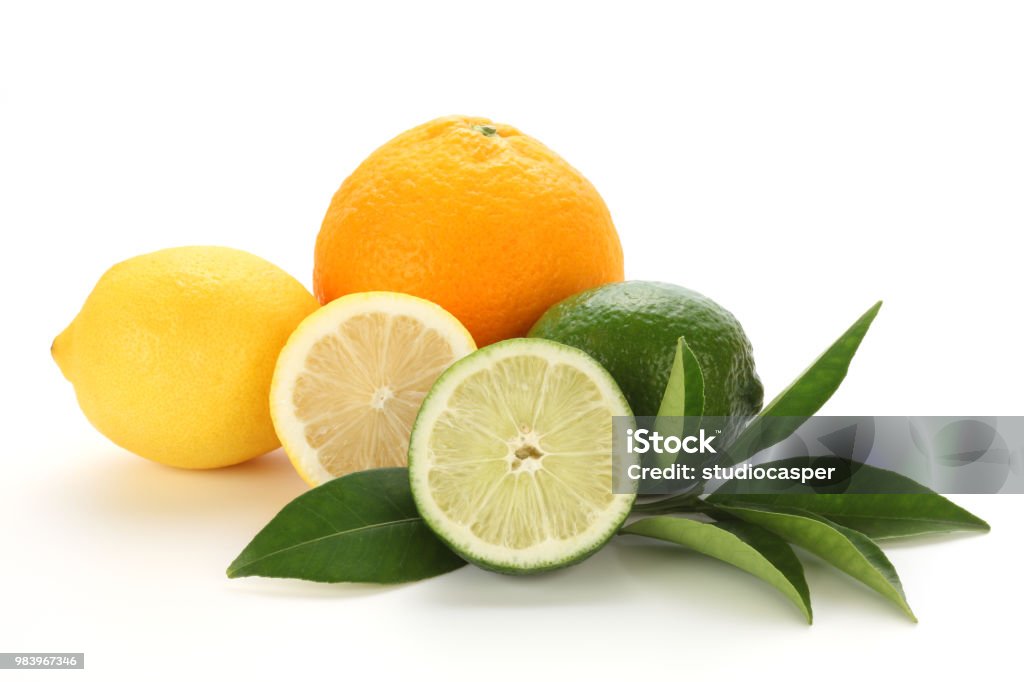 set of citrus fruit with leaves on white background Citrus fruits (lemon, lime, orange) isolated on white background Citrus Fruit Stock Photo