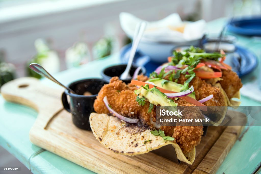 Traditional Mexican taco plate in the Mexican Caribbean Traditional Mexican taco plate in the Mexican Caribbean in a restaurant with beautiful setting Food Stock Photo