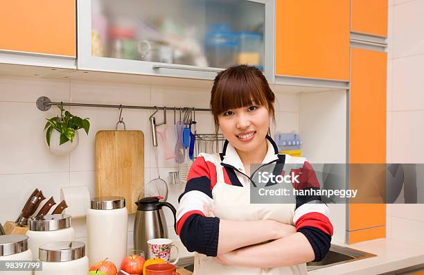 Housewife In Her Kitchen Stock Photo - Download Image Now - Adult, Adults Only, Apron