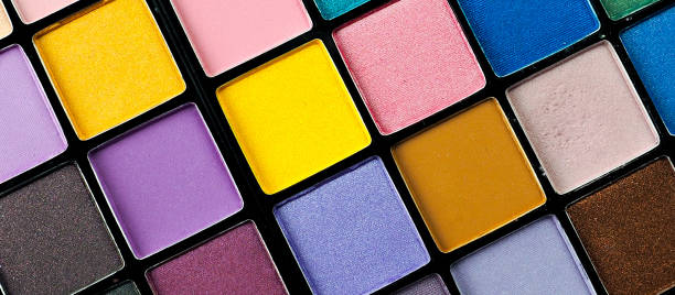 istock Makeup background. Colorful makeup palette, banner for website 983986396