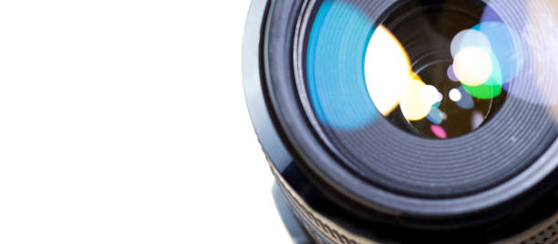 istock Camera lens with bokeh lights background, banner for website 983995092
